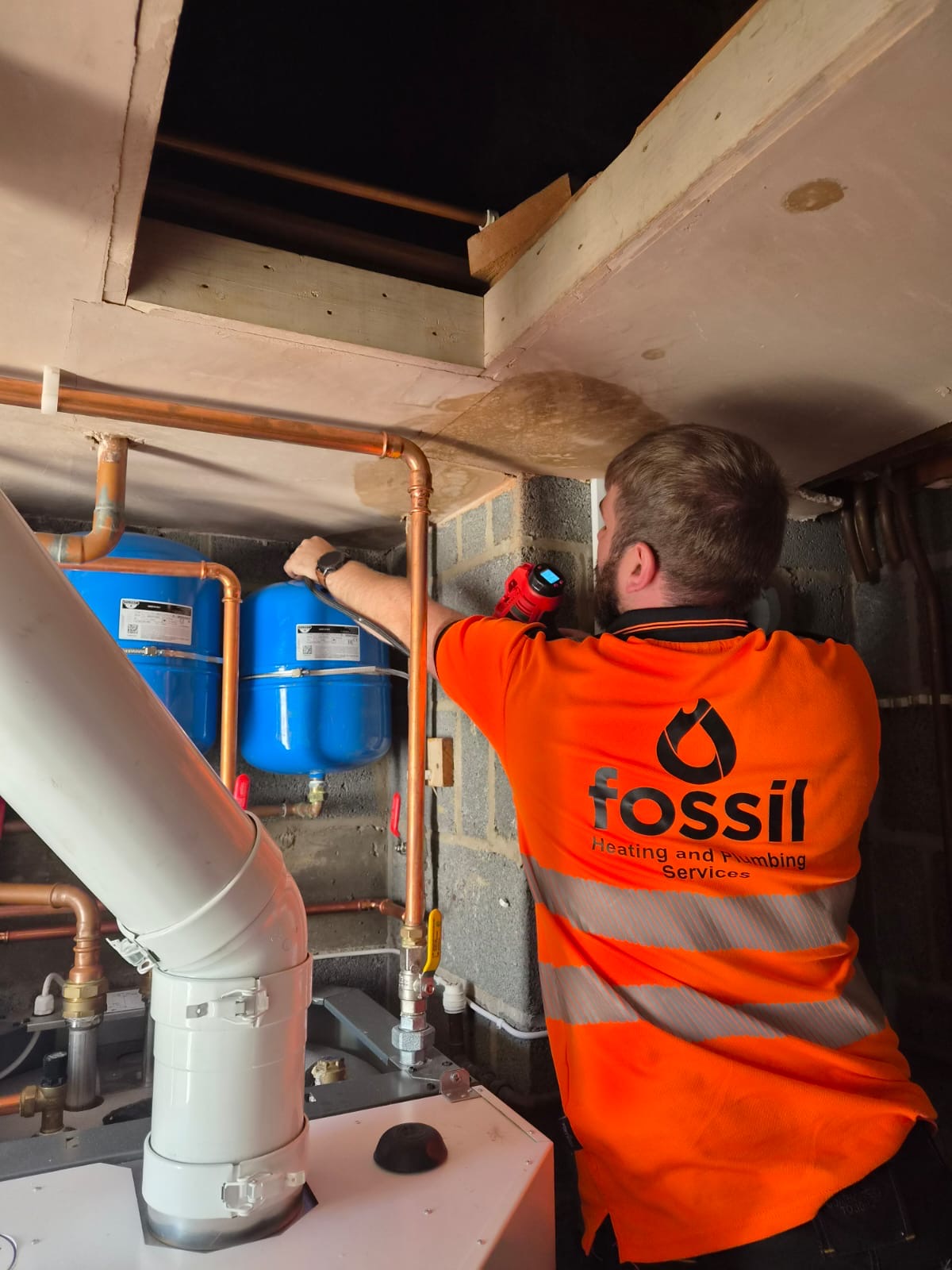 Fossil Heating plumbing repair in progress